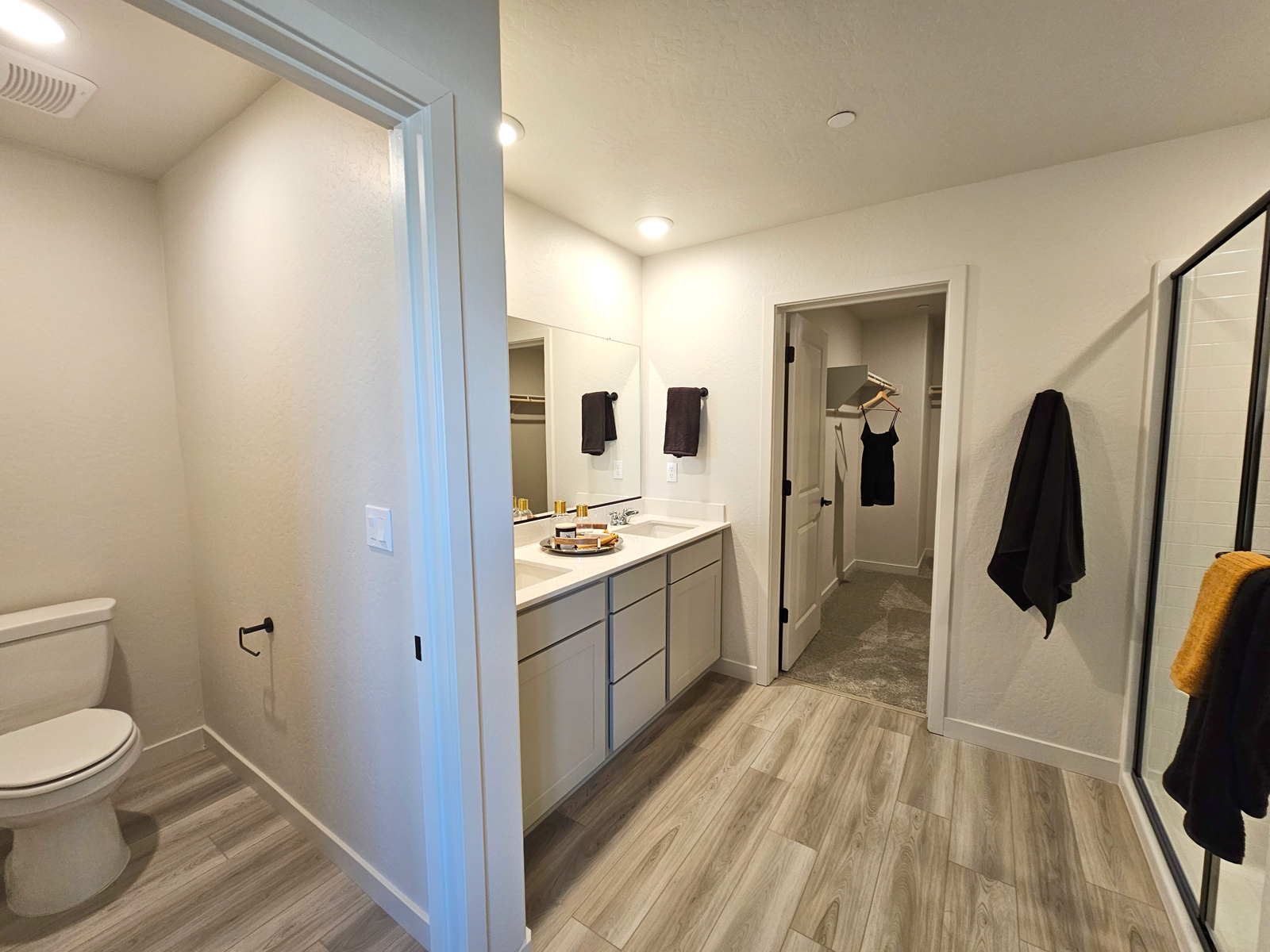 A bathroom with a toilet and sink.