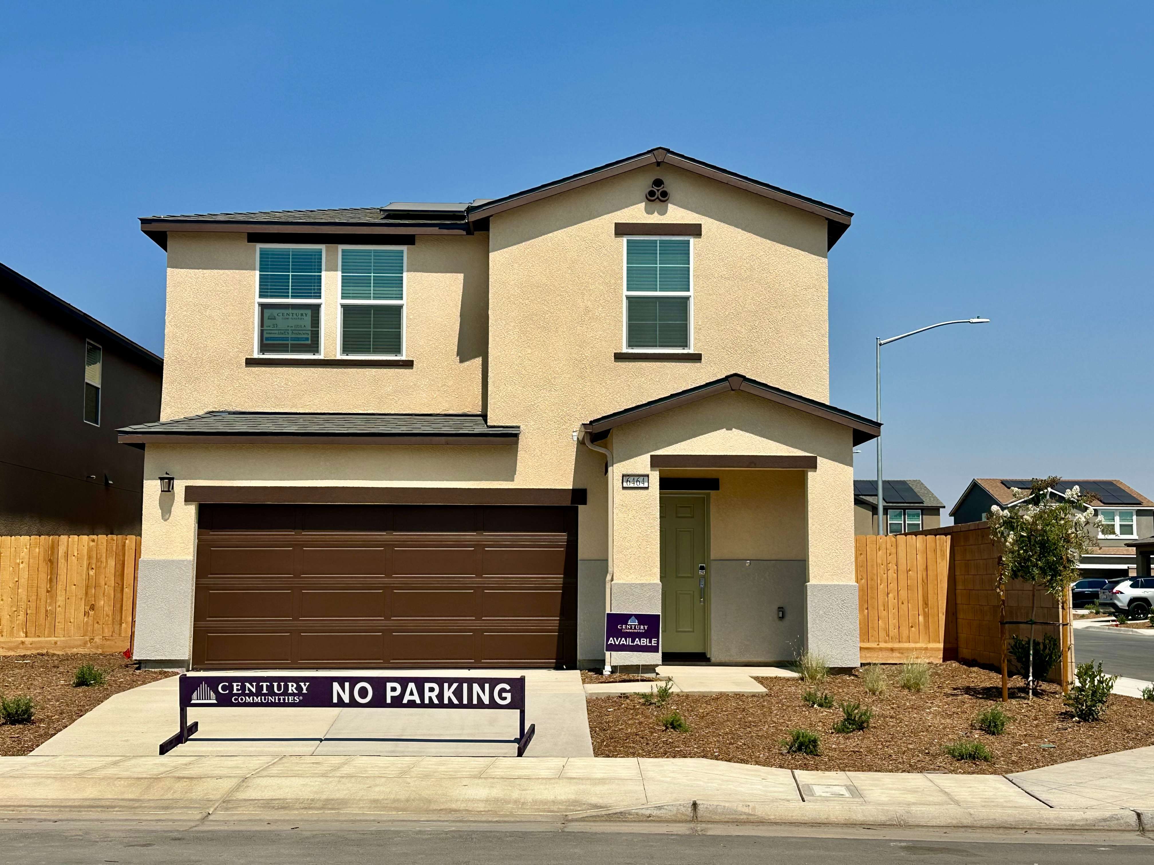 A building with a sign in front.