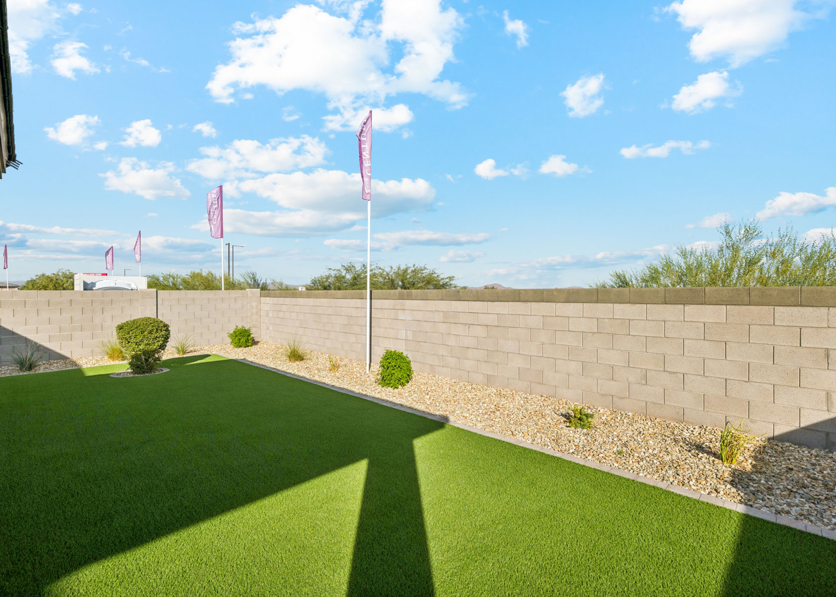 A wall with flags on it.