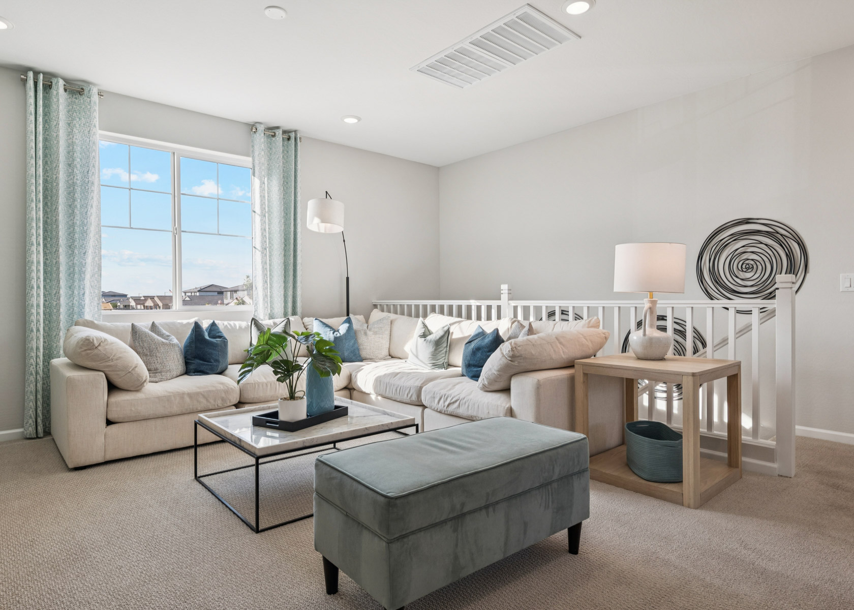 A living room with a couch and a coffee table.