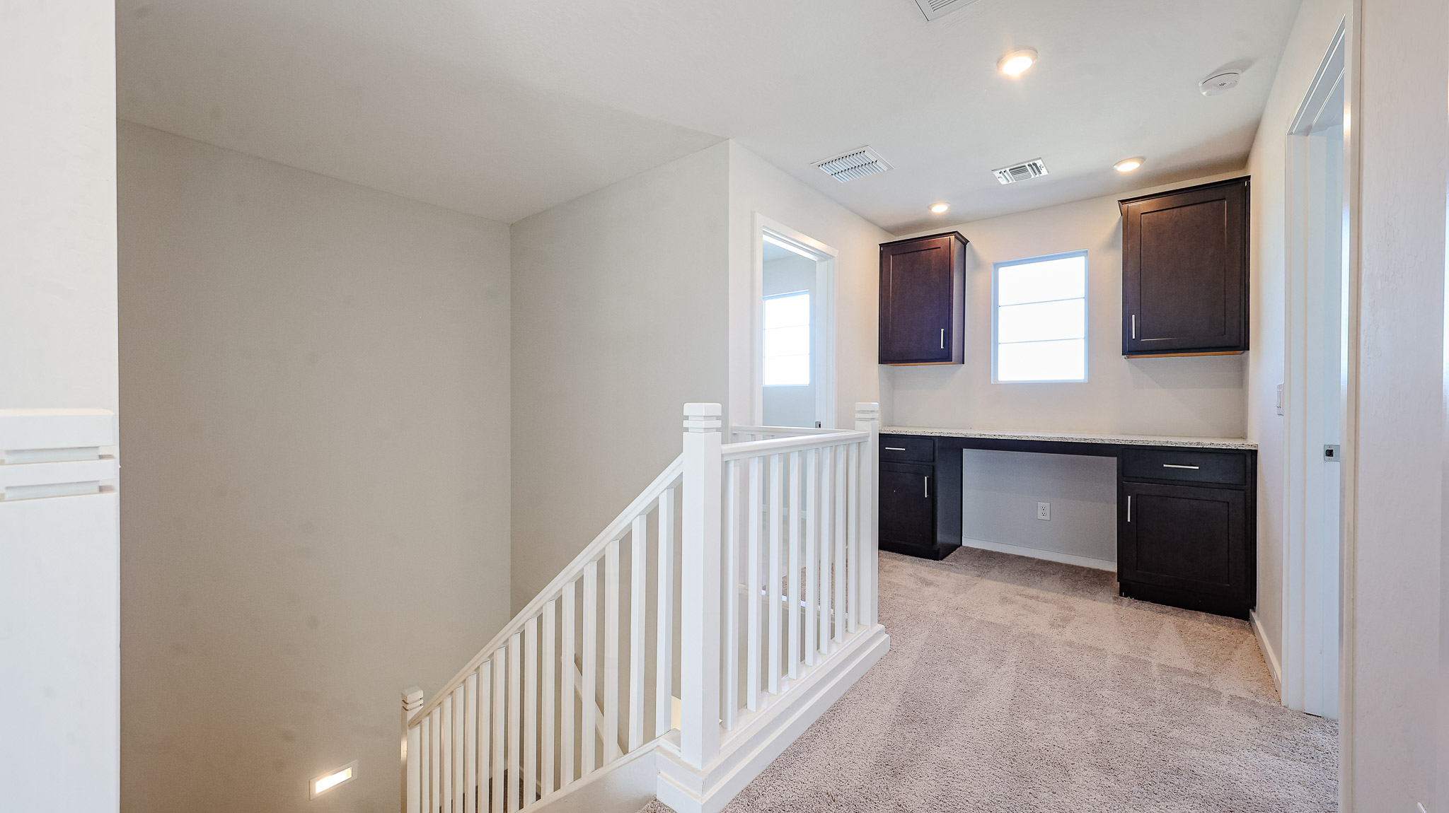 A white staircase in a house.