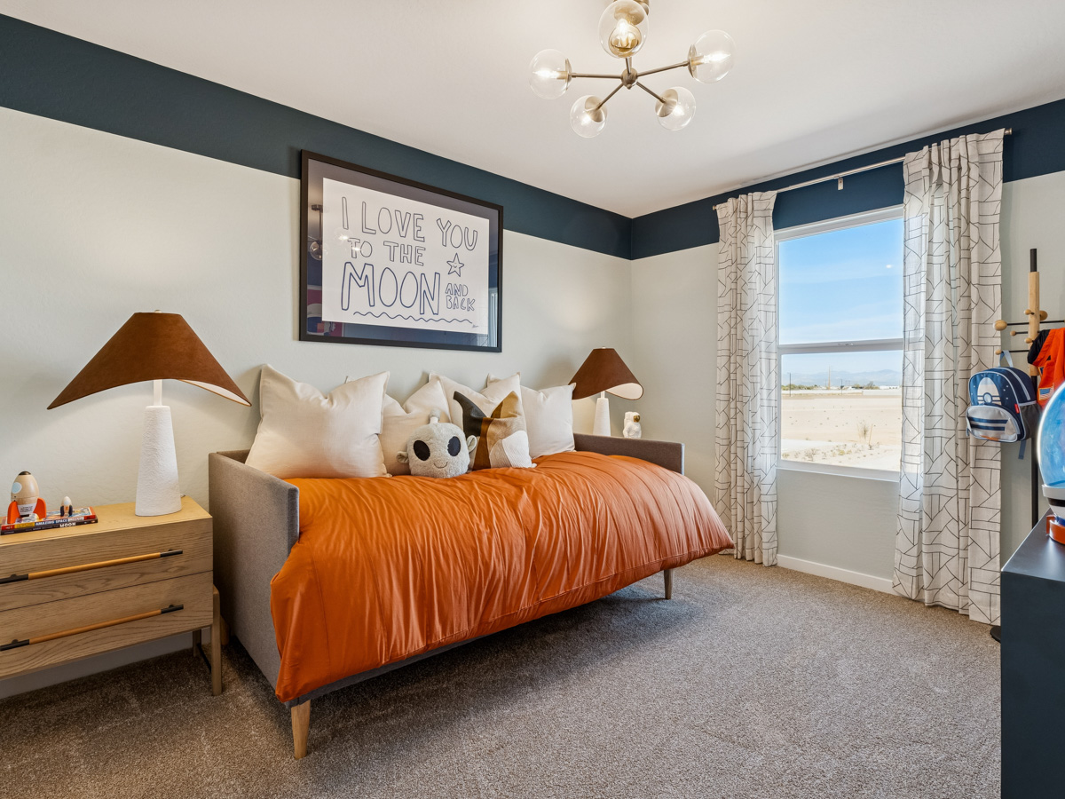 A bedroom with a large bed.