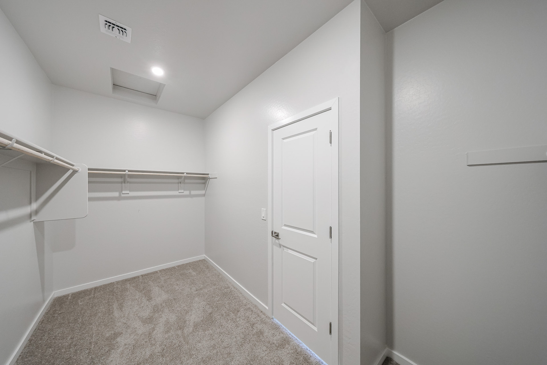 A white door in a room.