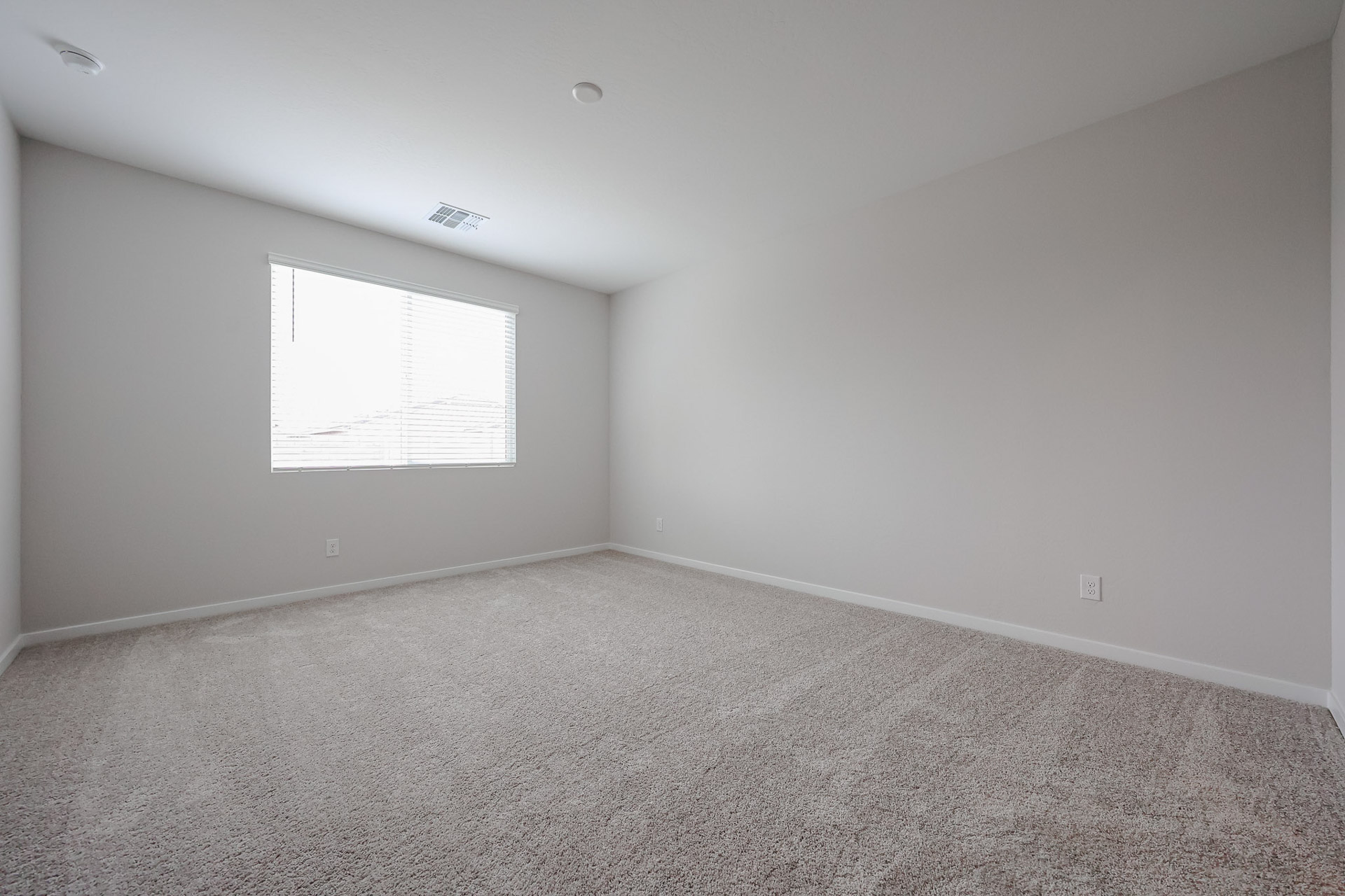 A room with a whiteboard.