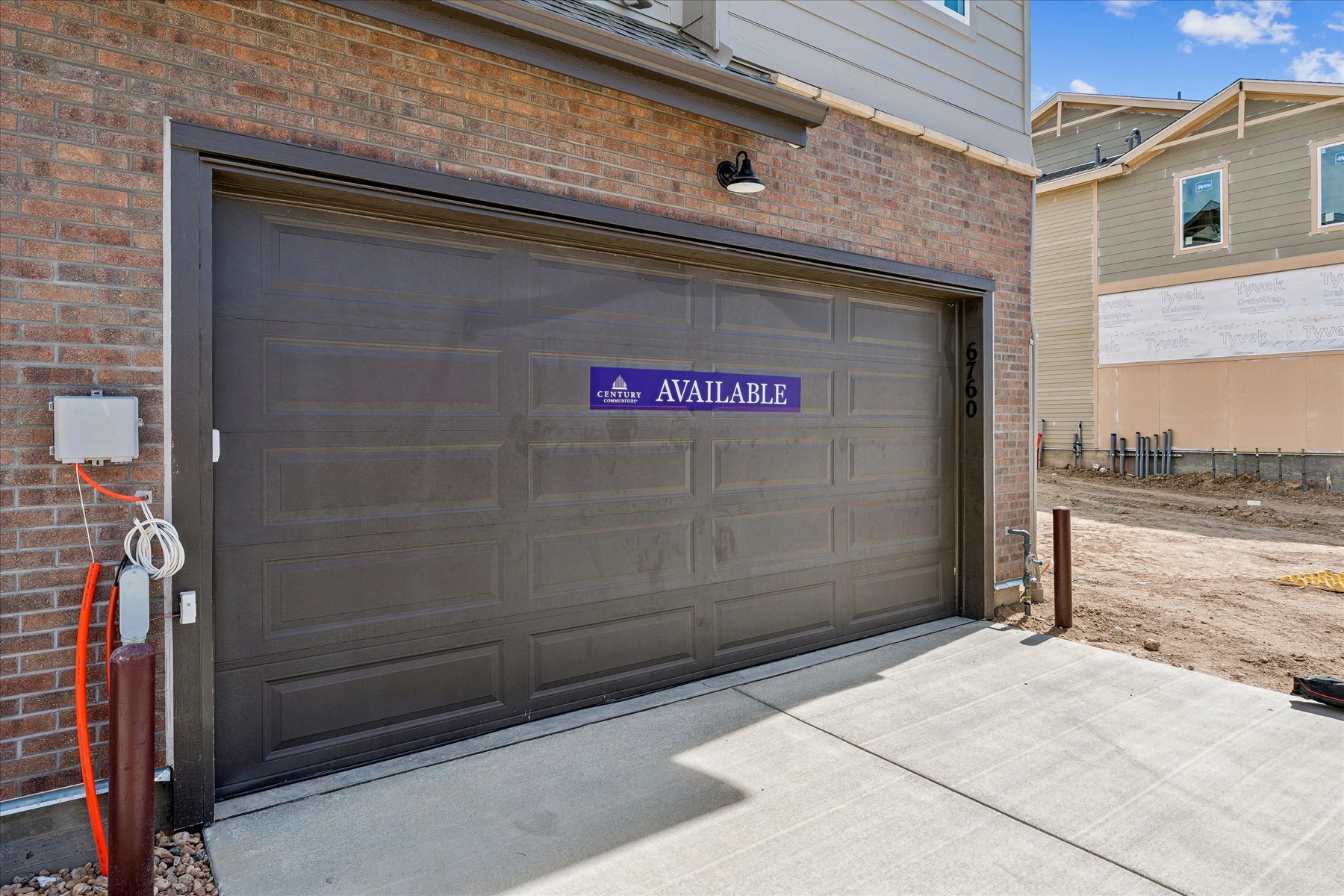A garage door with a sign on it.