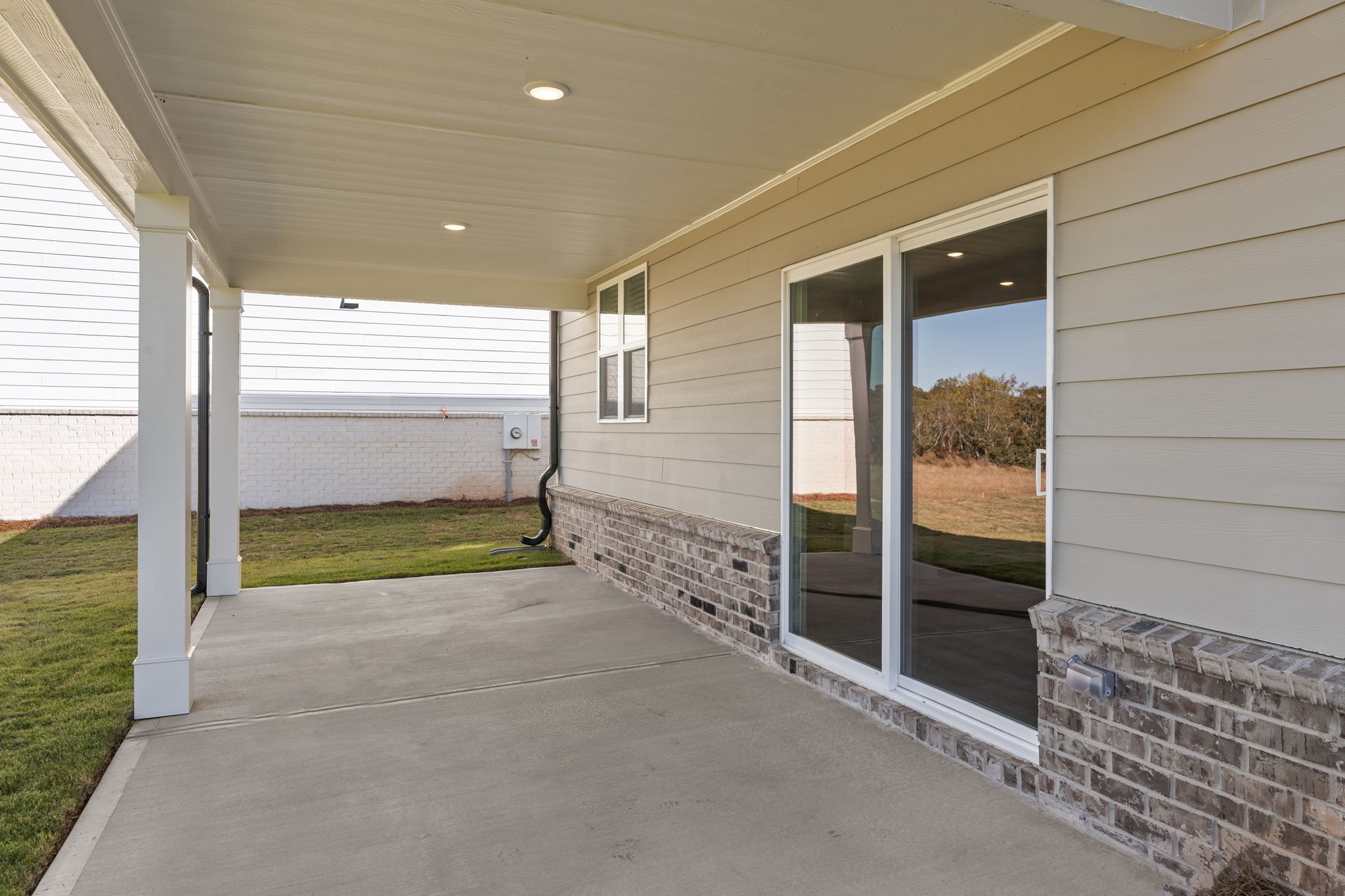 A house with a brick patio.