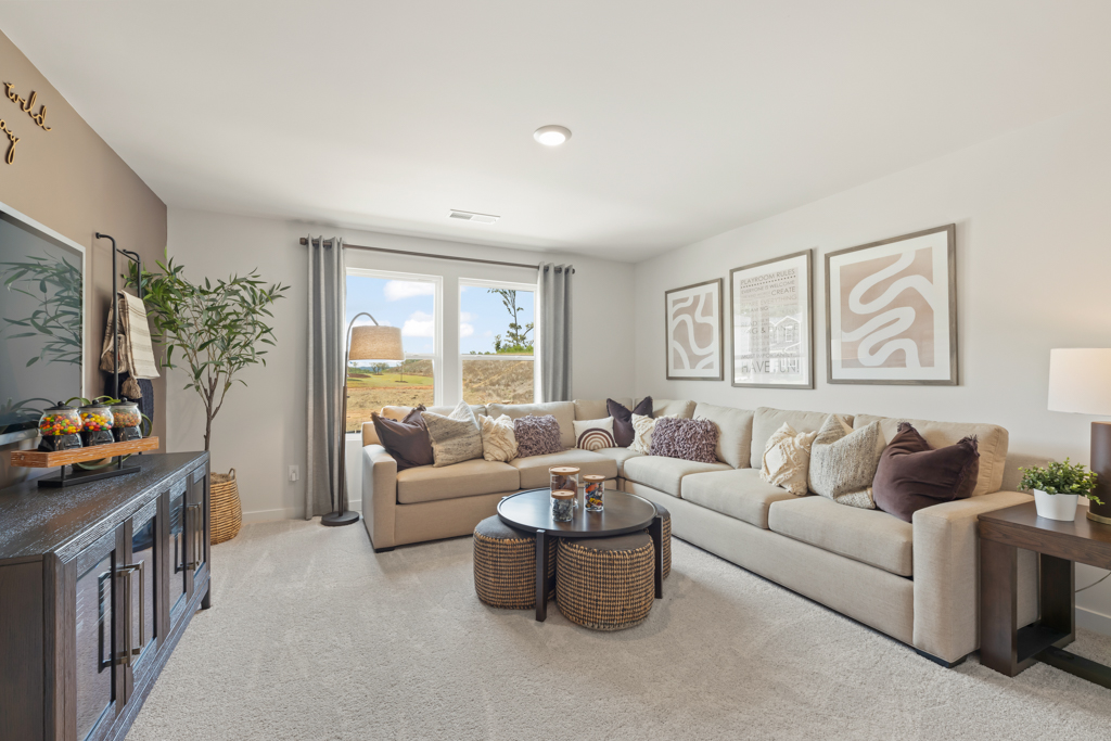A living room with a couch and a coffee table.