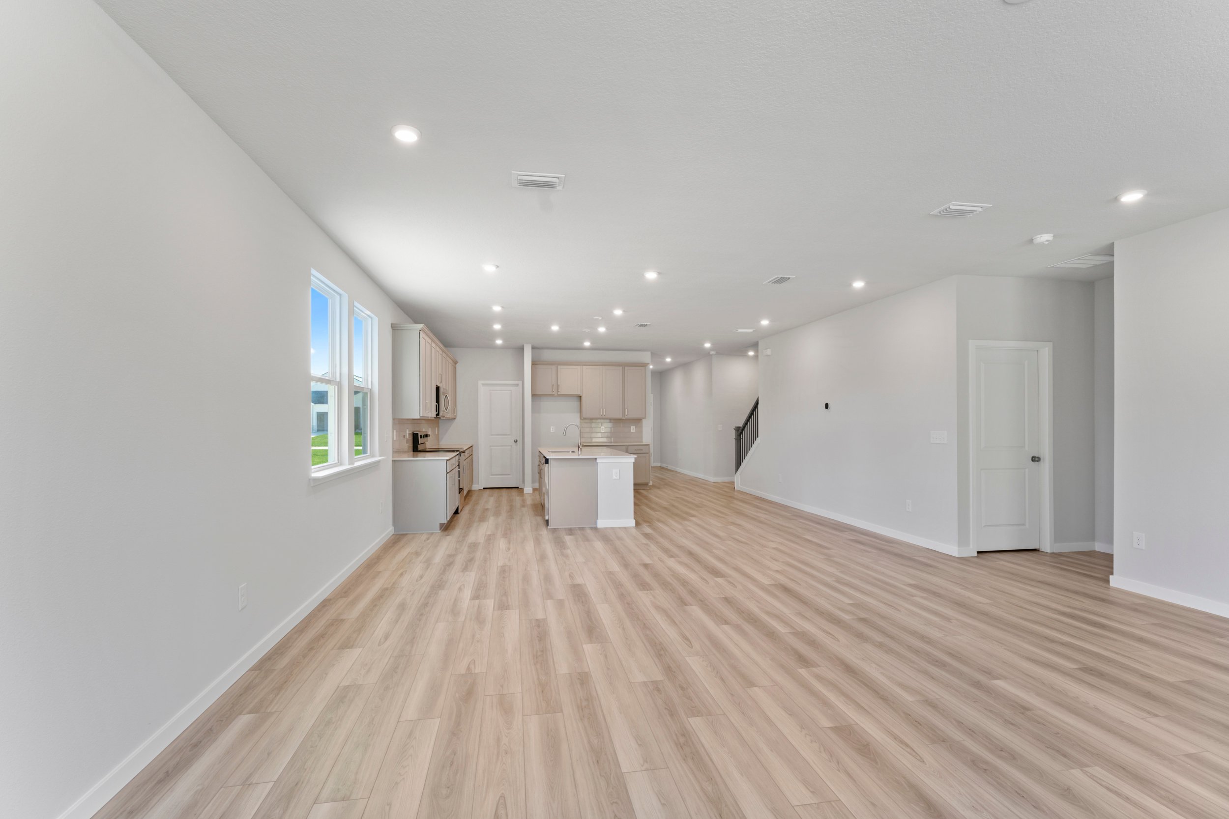 Lot 529 Chef's Kitchen with Gray Cabinets at NorthShore in Kingsland