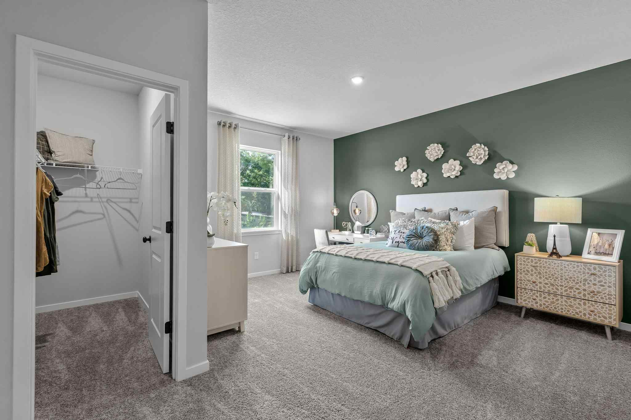 A bedroom with a large bed.