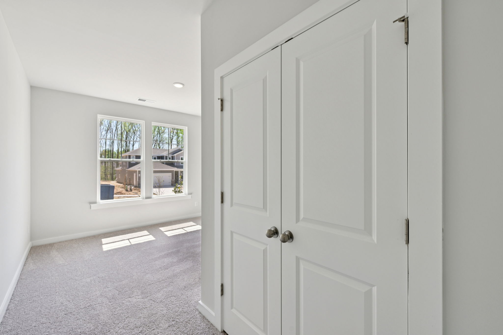A white door in a room.