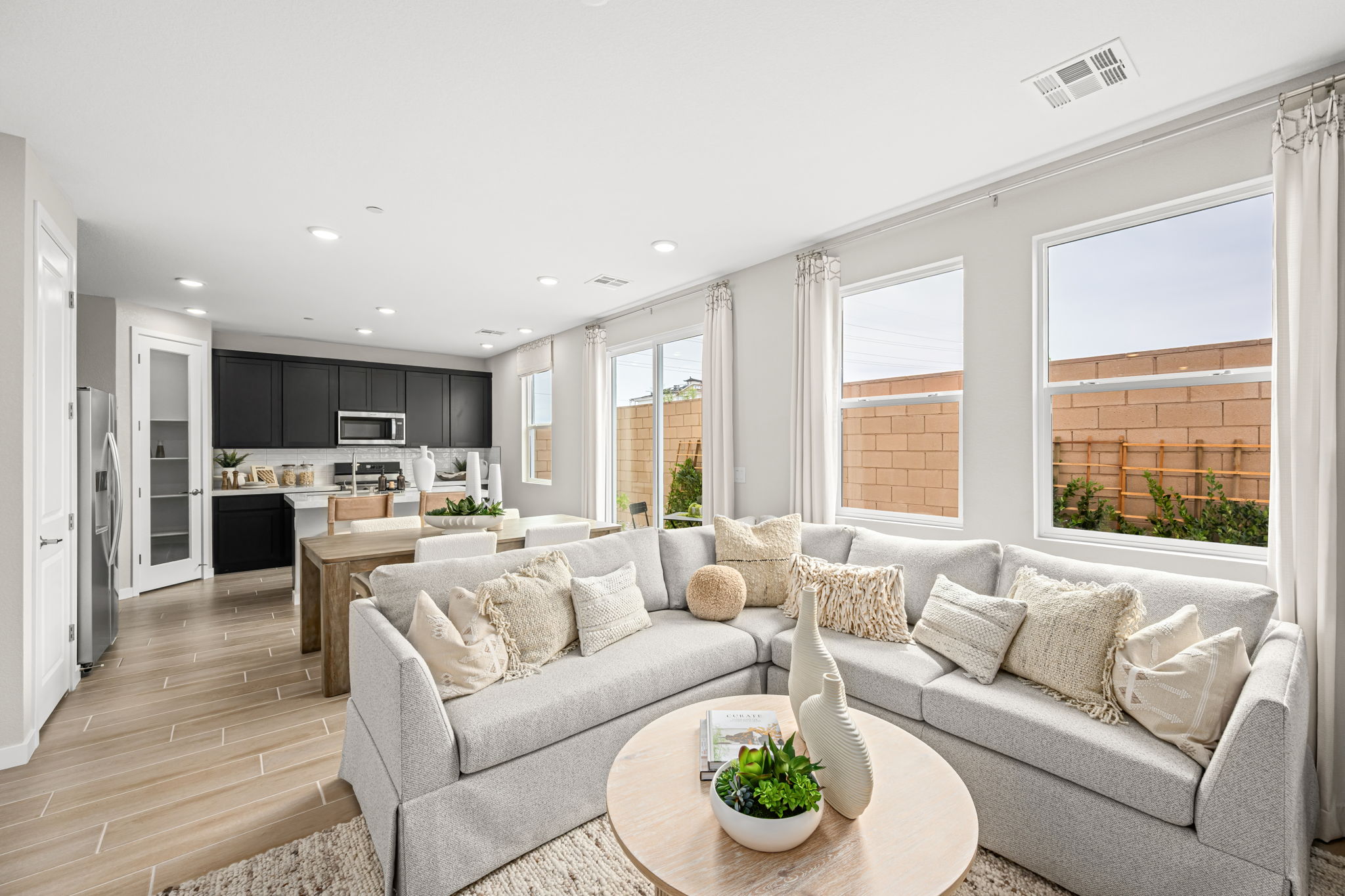 A living room with a large window.