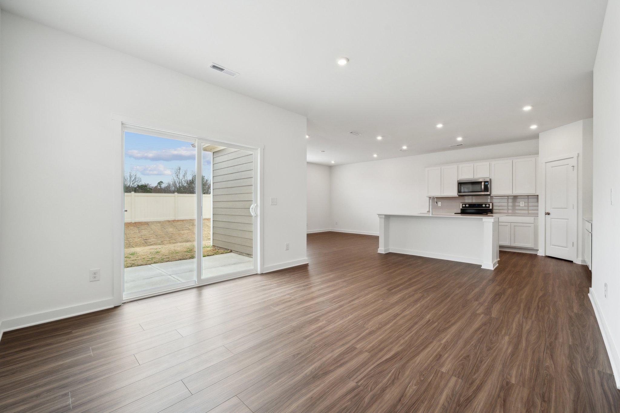A large empty living room.