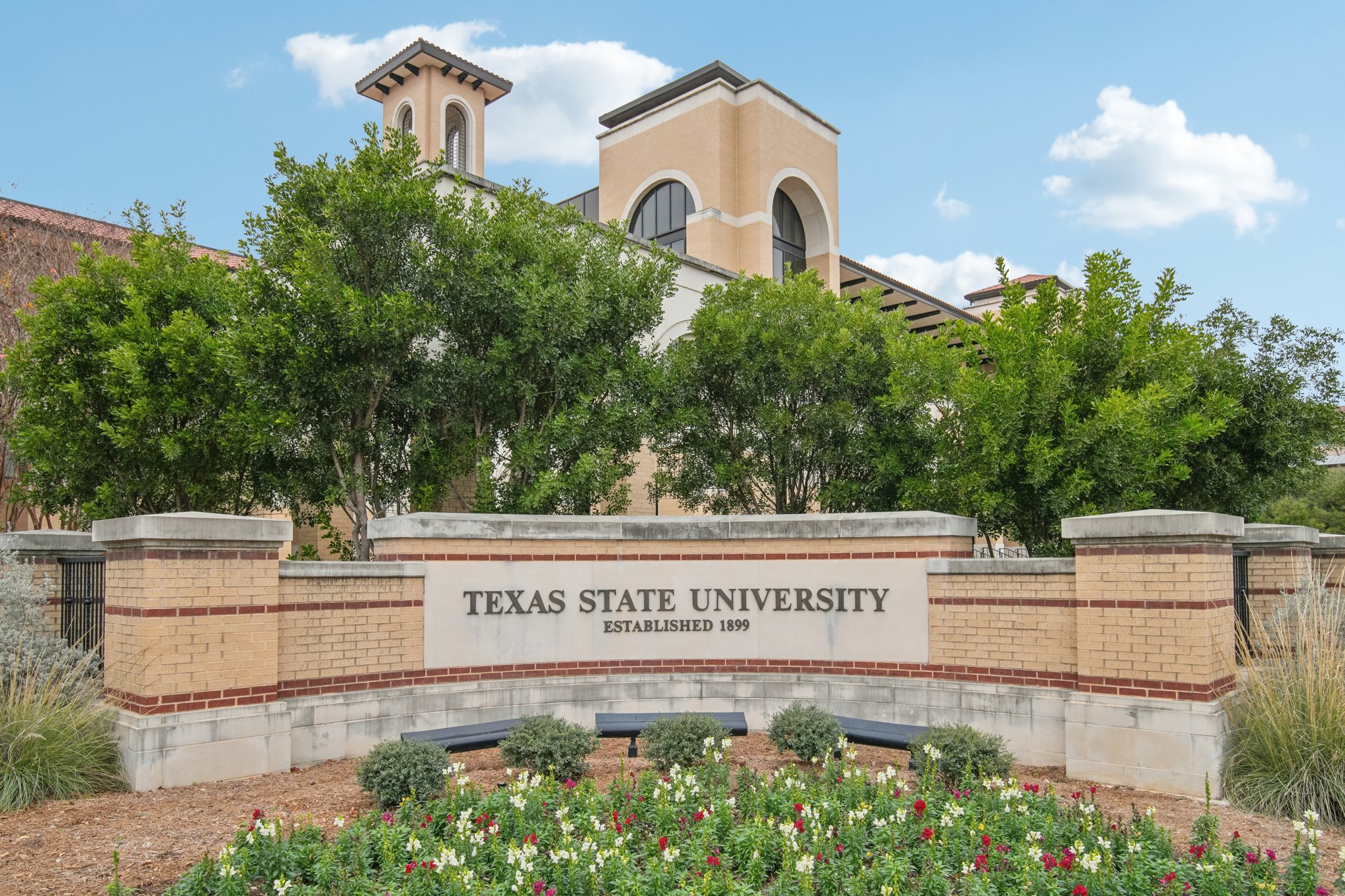 A sign in front of a building.