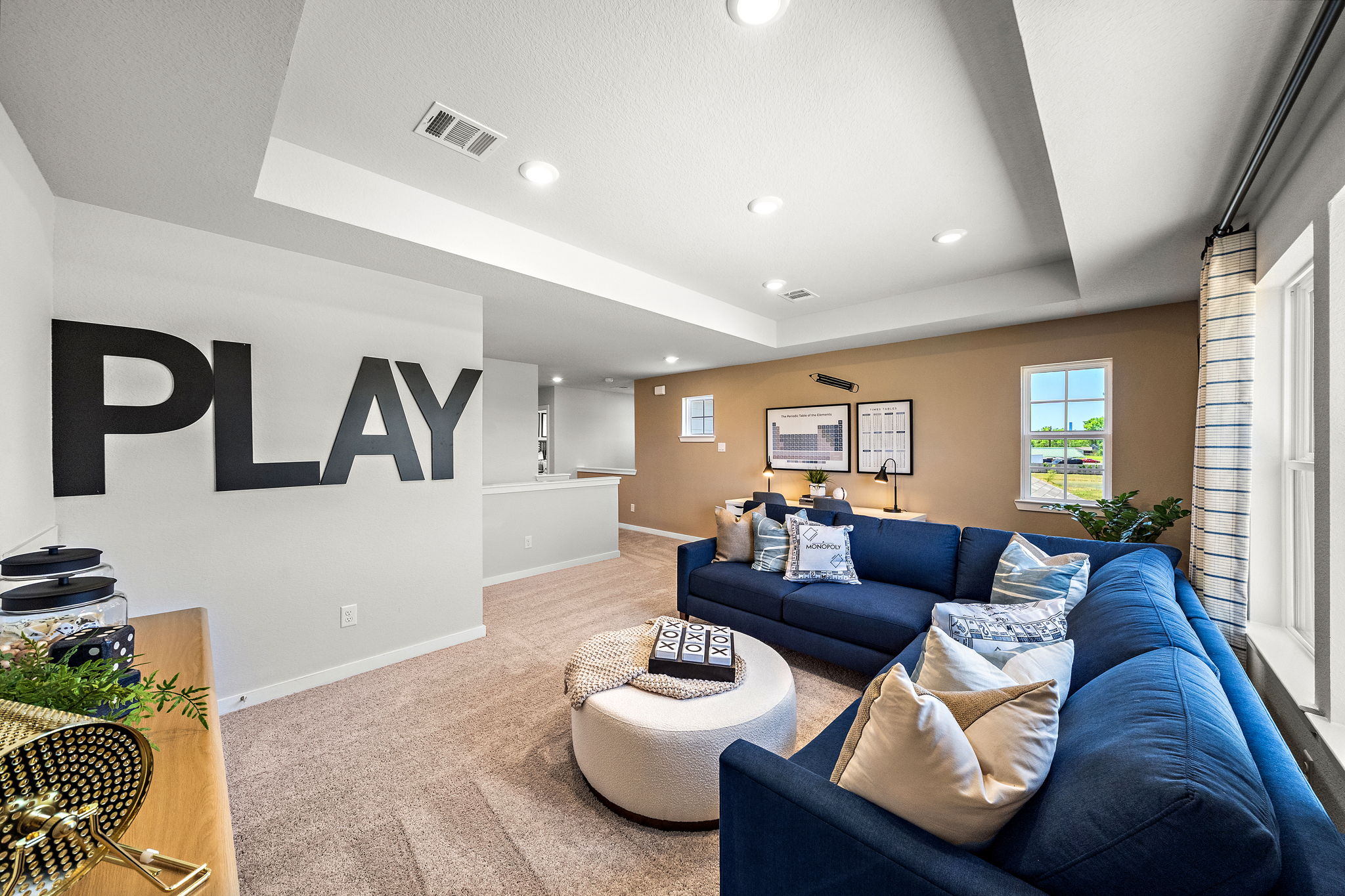 A living room with a couch and a coffee table.