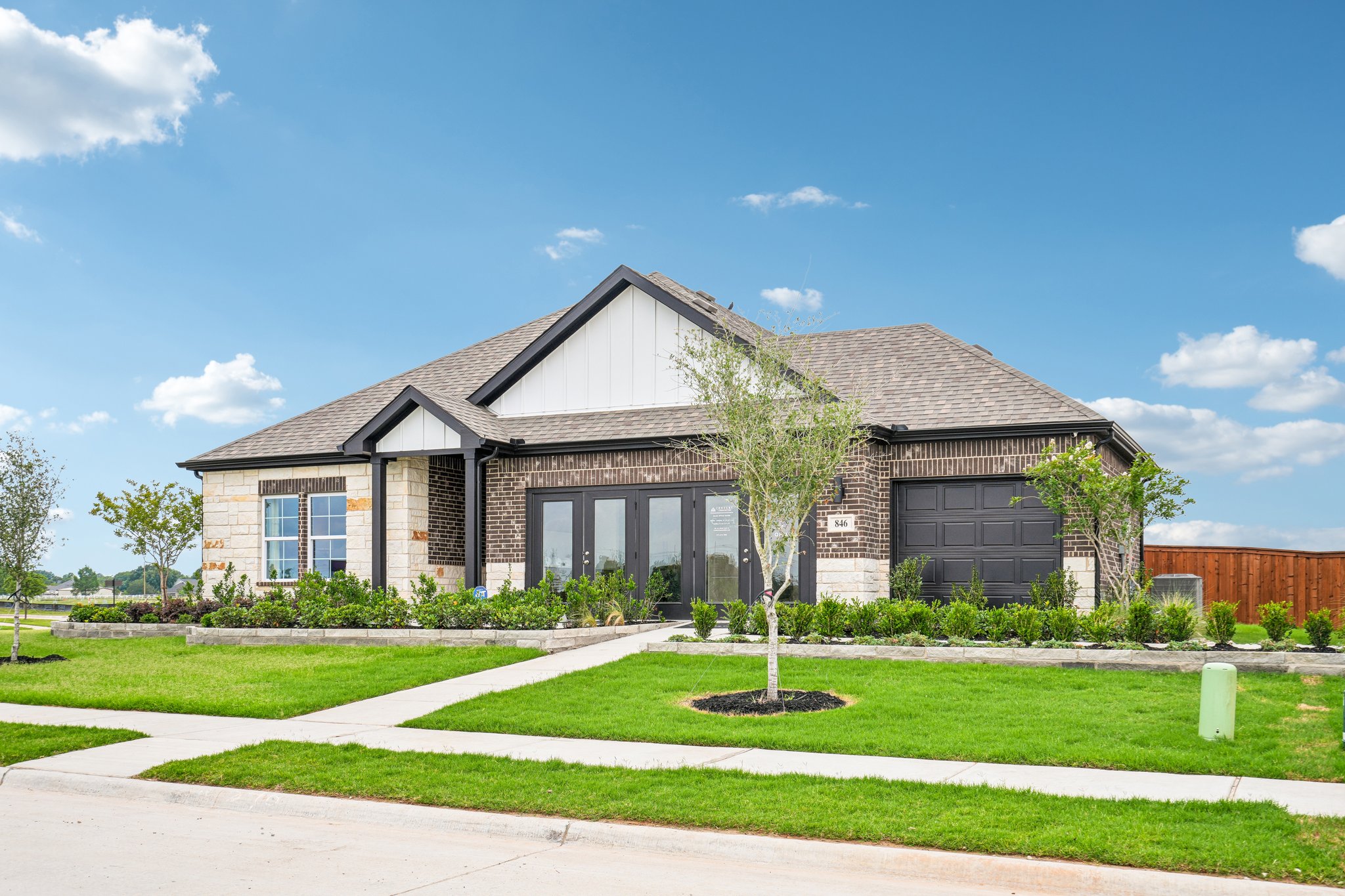 A house with a large front yard.