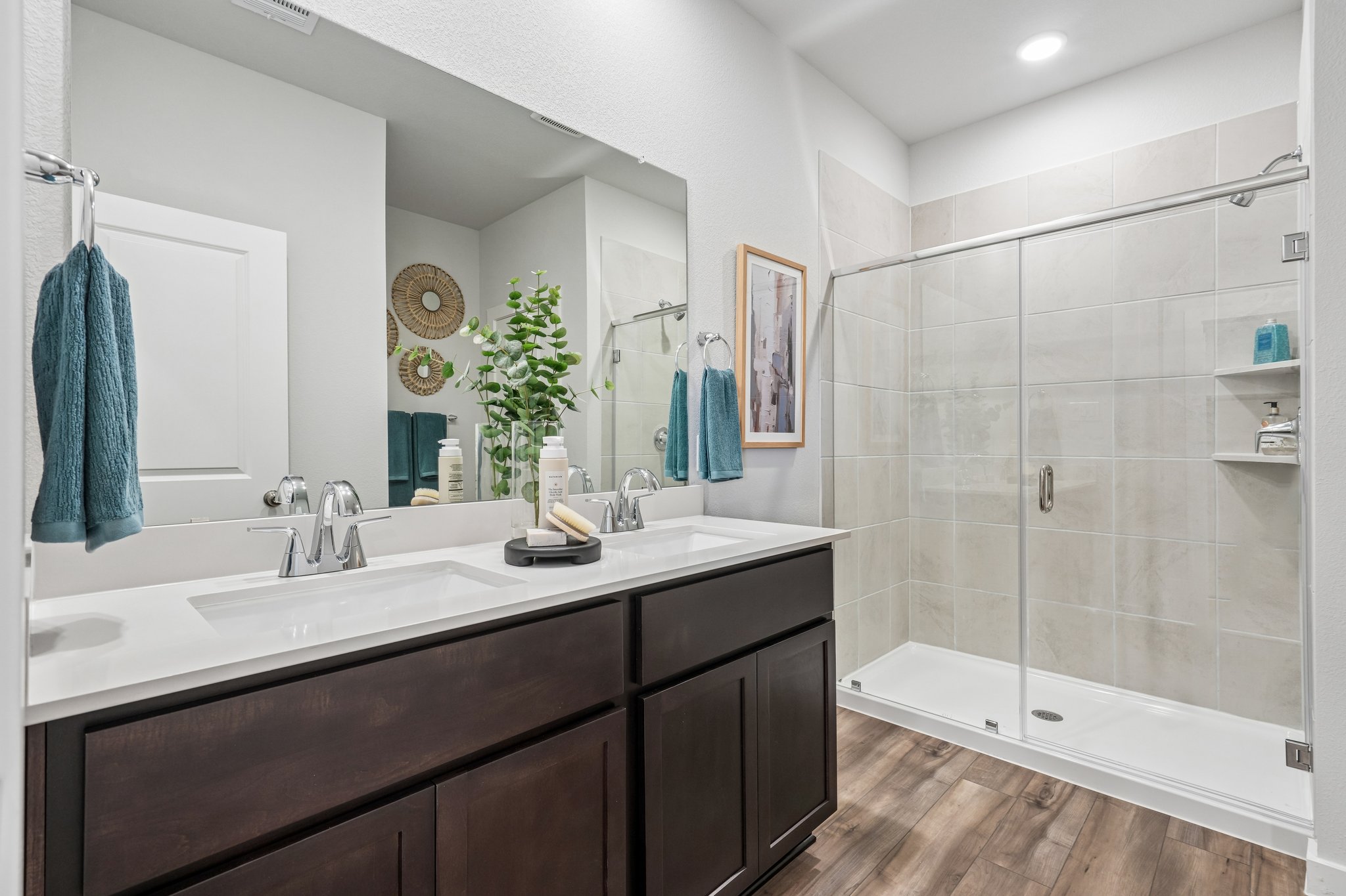 A bathroom with a glass shower.