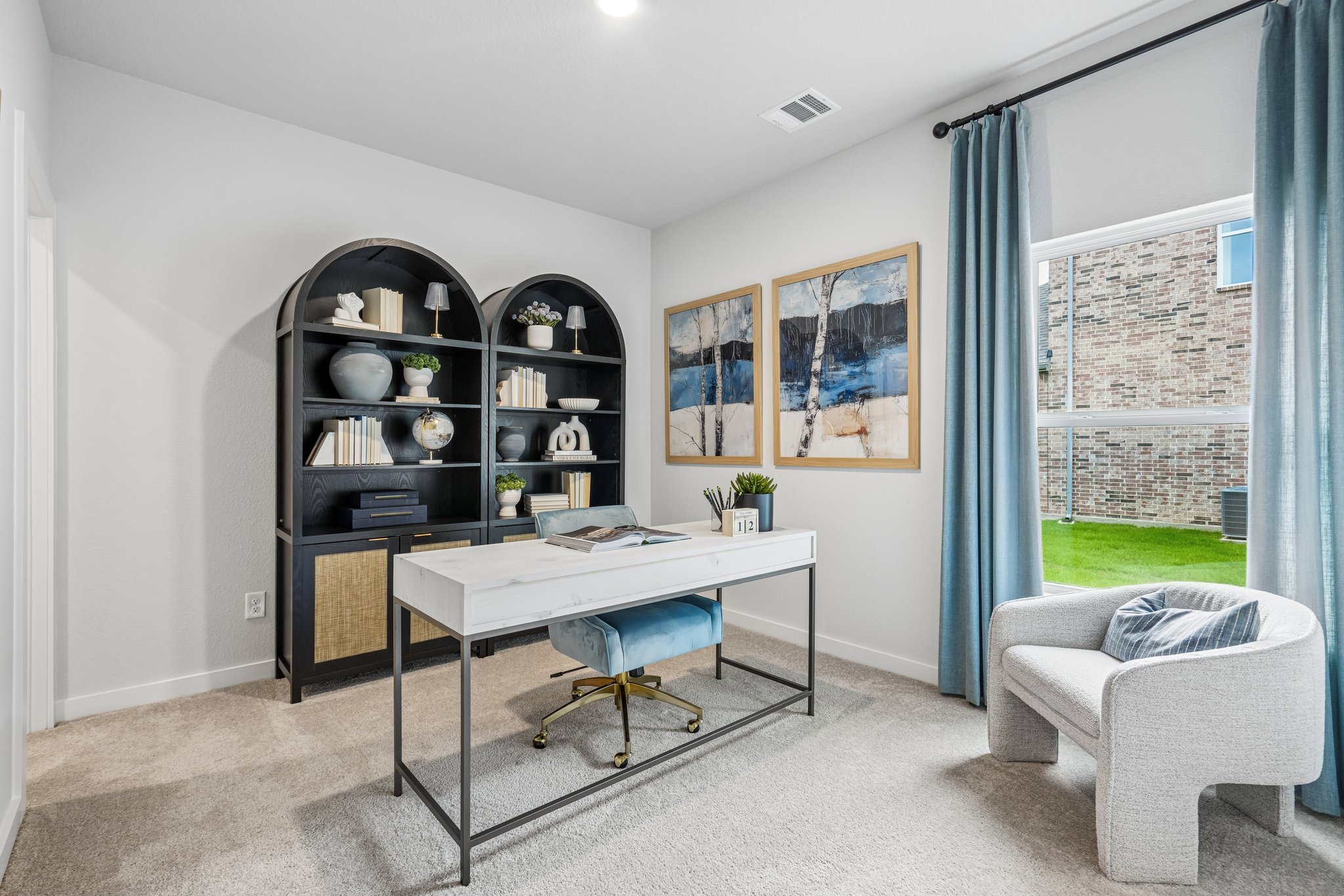A room with a table and chairs.
