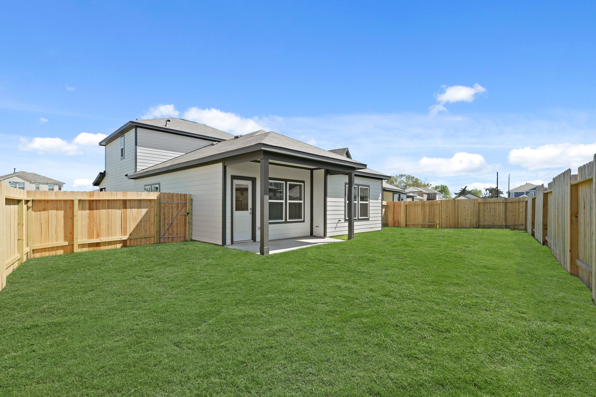 A house with a fence around it.