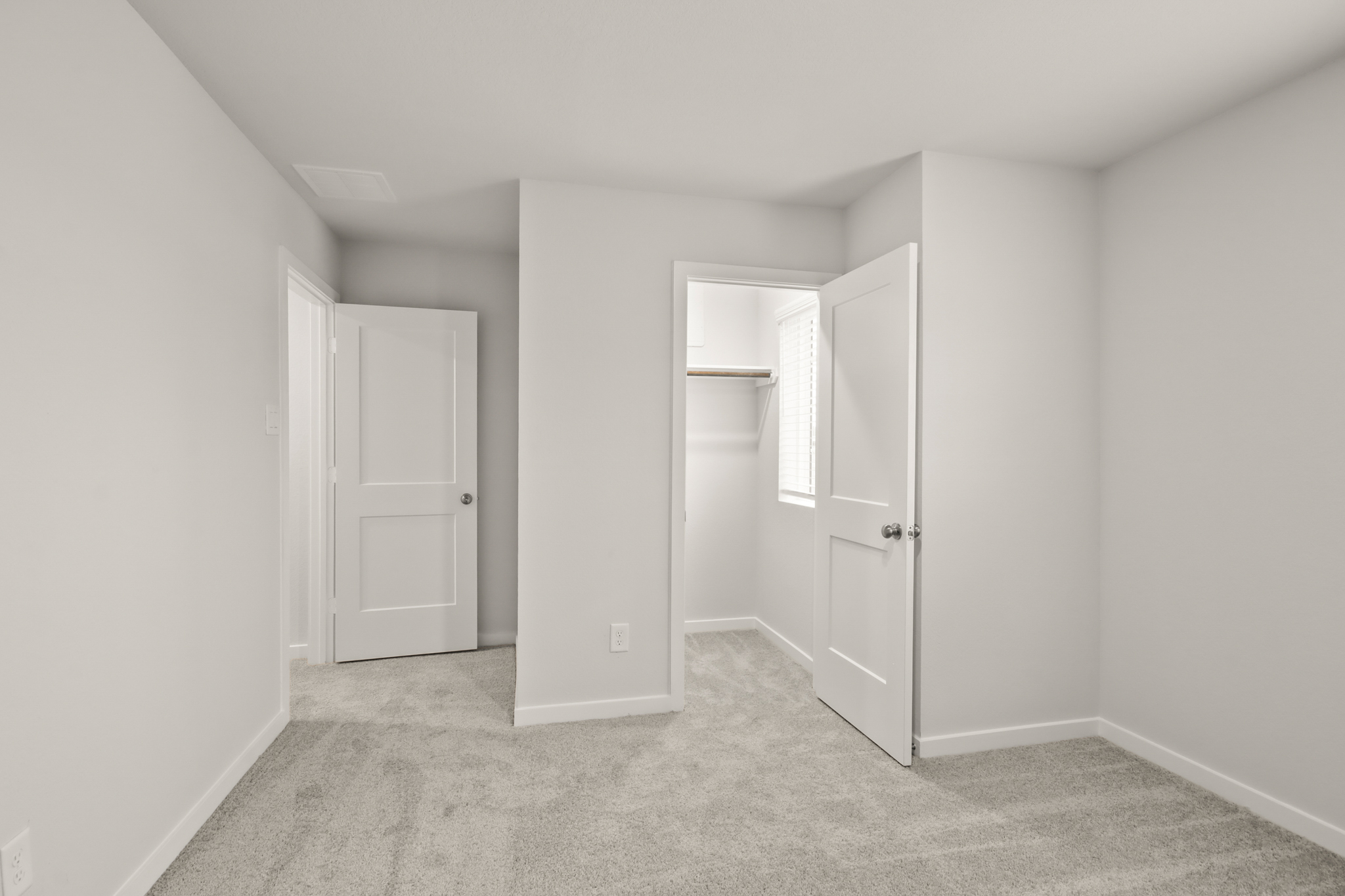 A room with white doors.