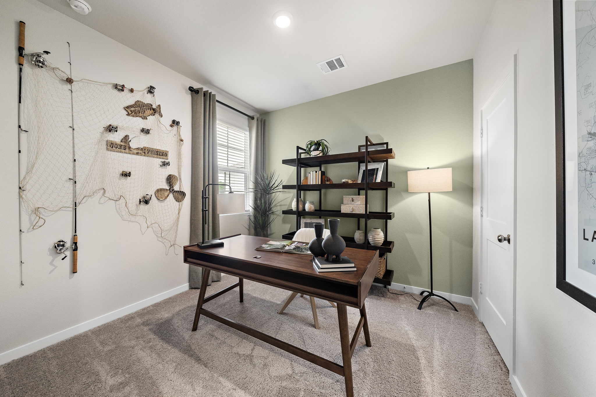 A room with a table and shelves.
