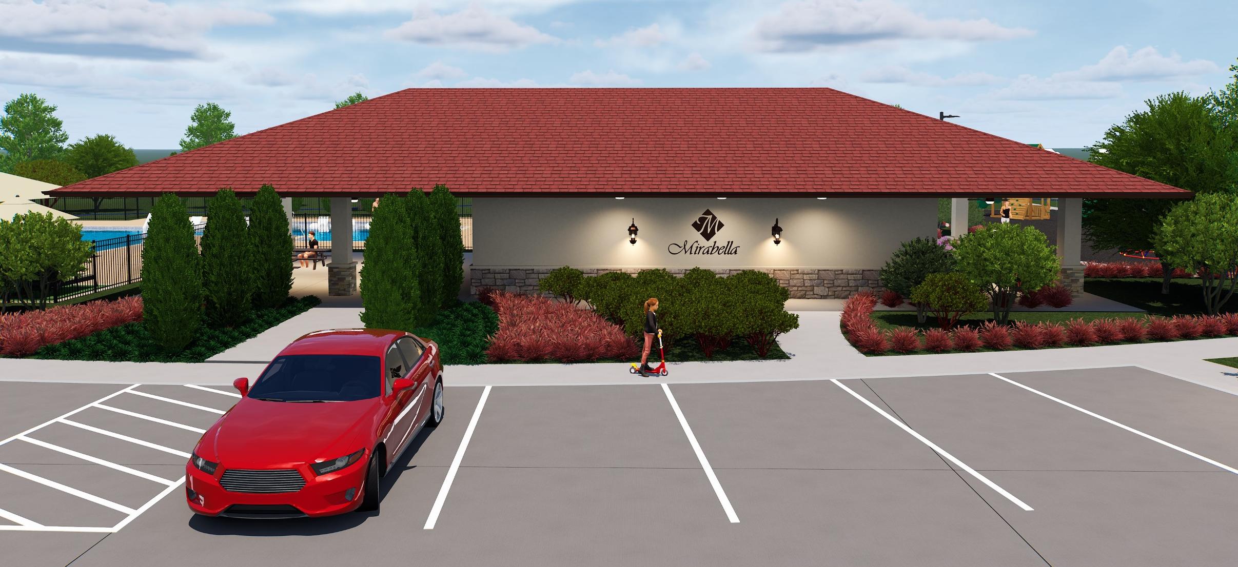 A red car parked in front of a building.