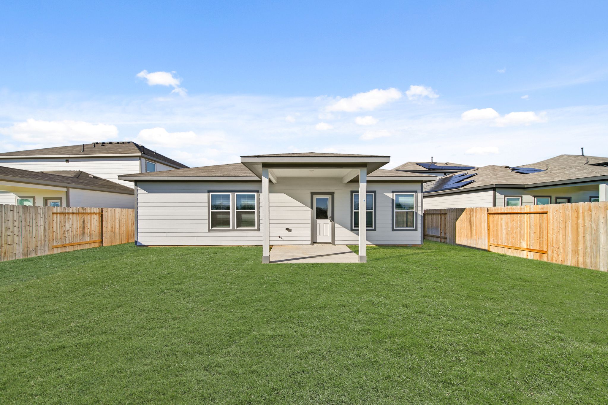 A house with a fence around it.