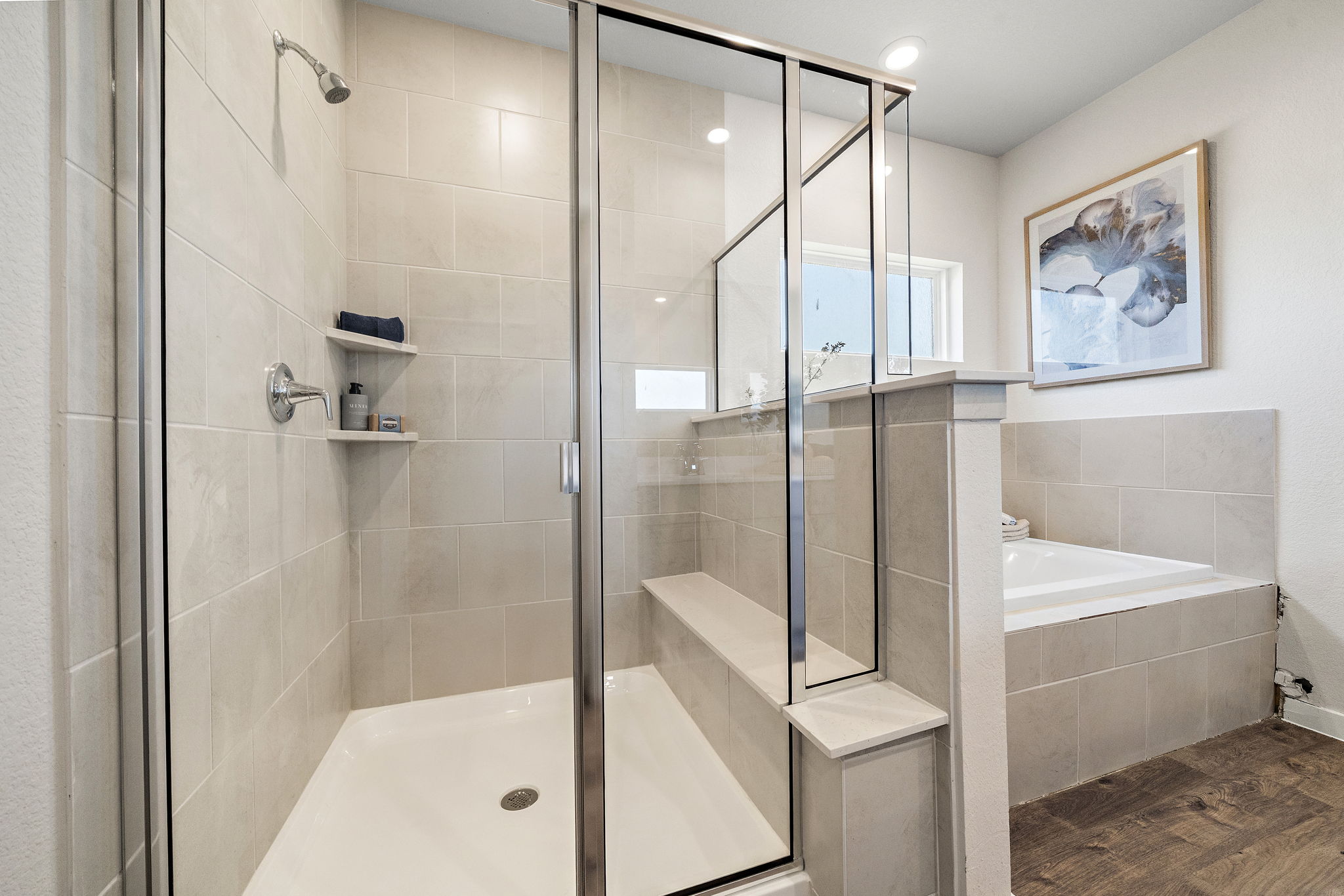 A bathroom with a glass shower.