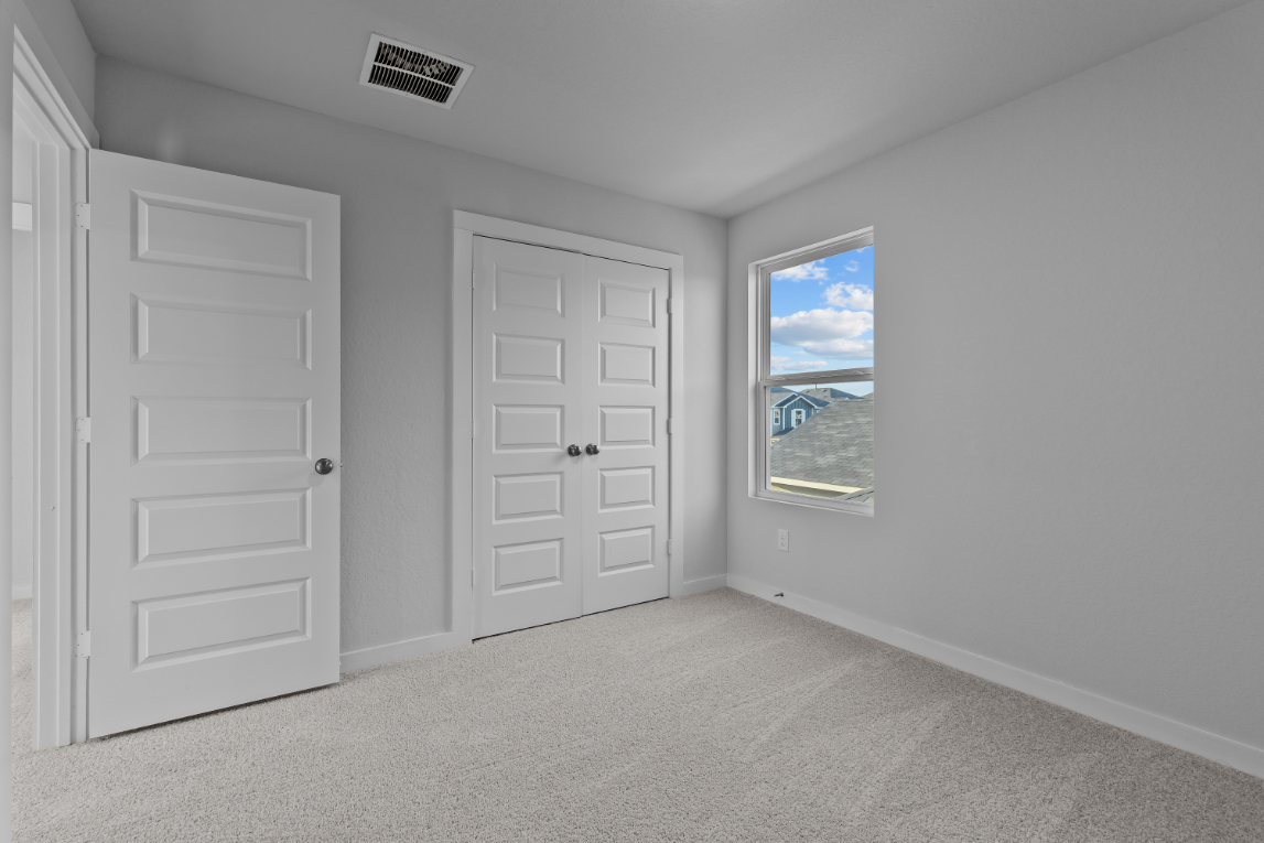 A room with white doors.