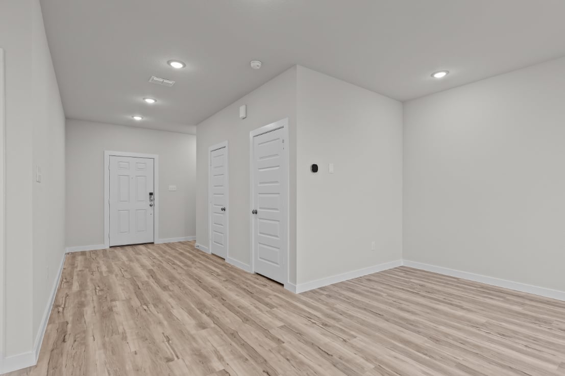 A room with white doors.