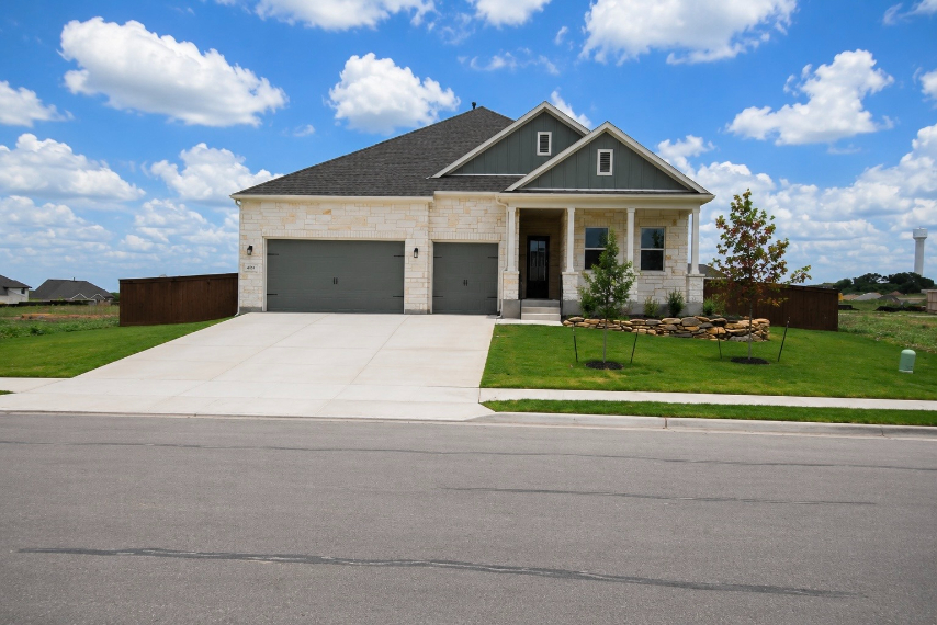 A house with a driveway.