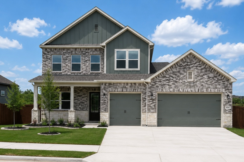 A house with garages and a driveway.