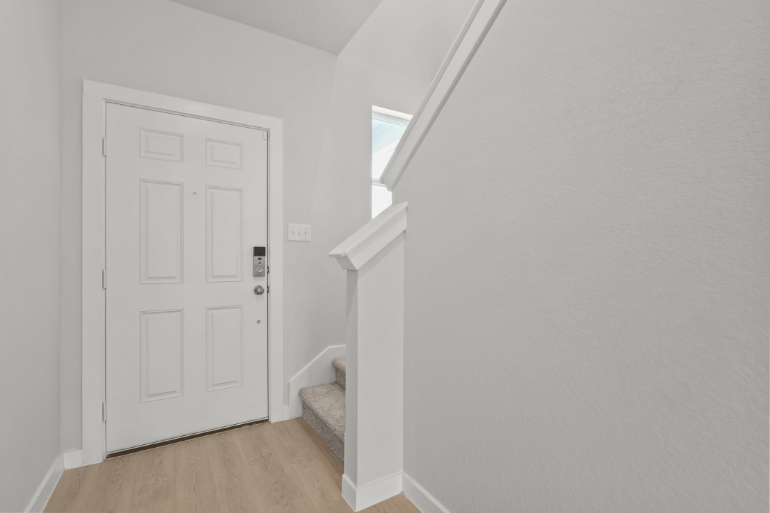 A white door in a room.