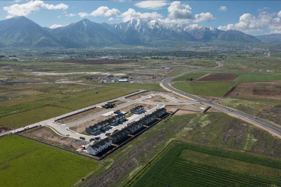 A large building in a field.