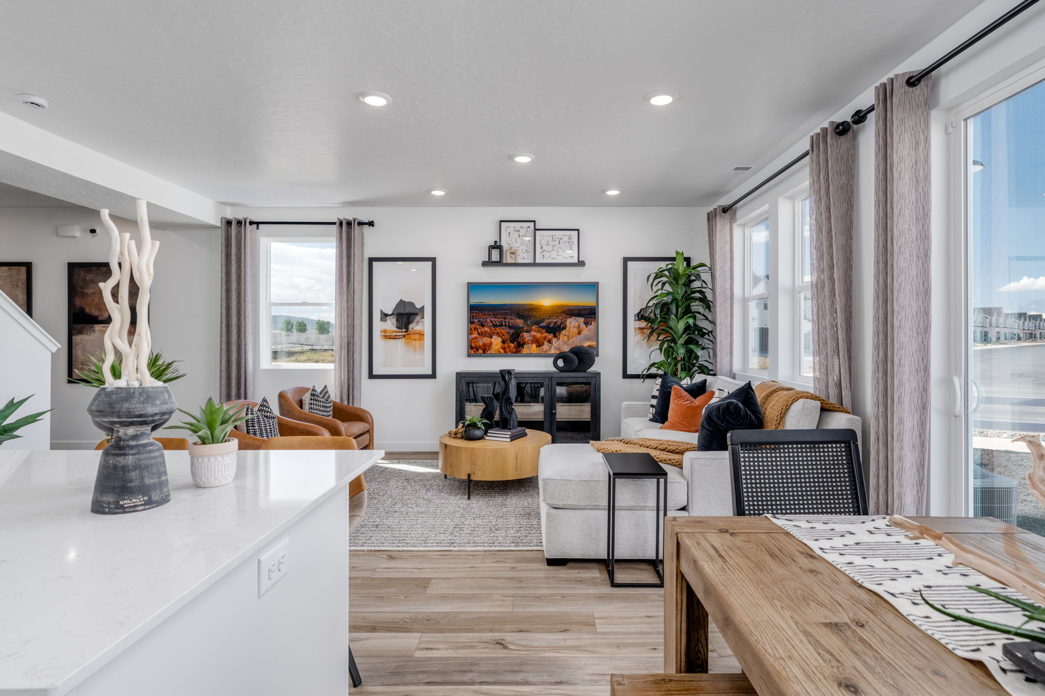 A living room with a large window.