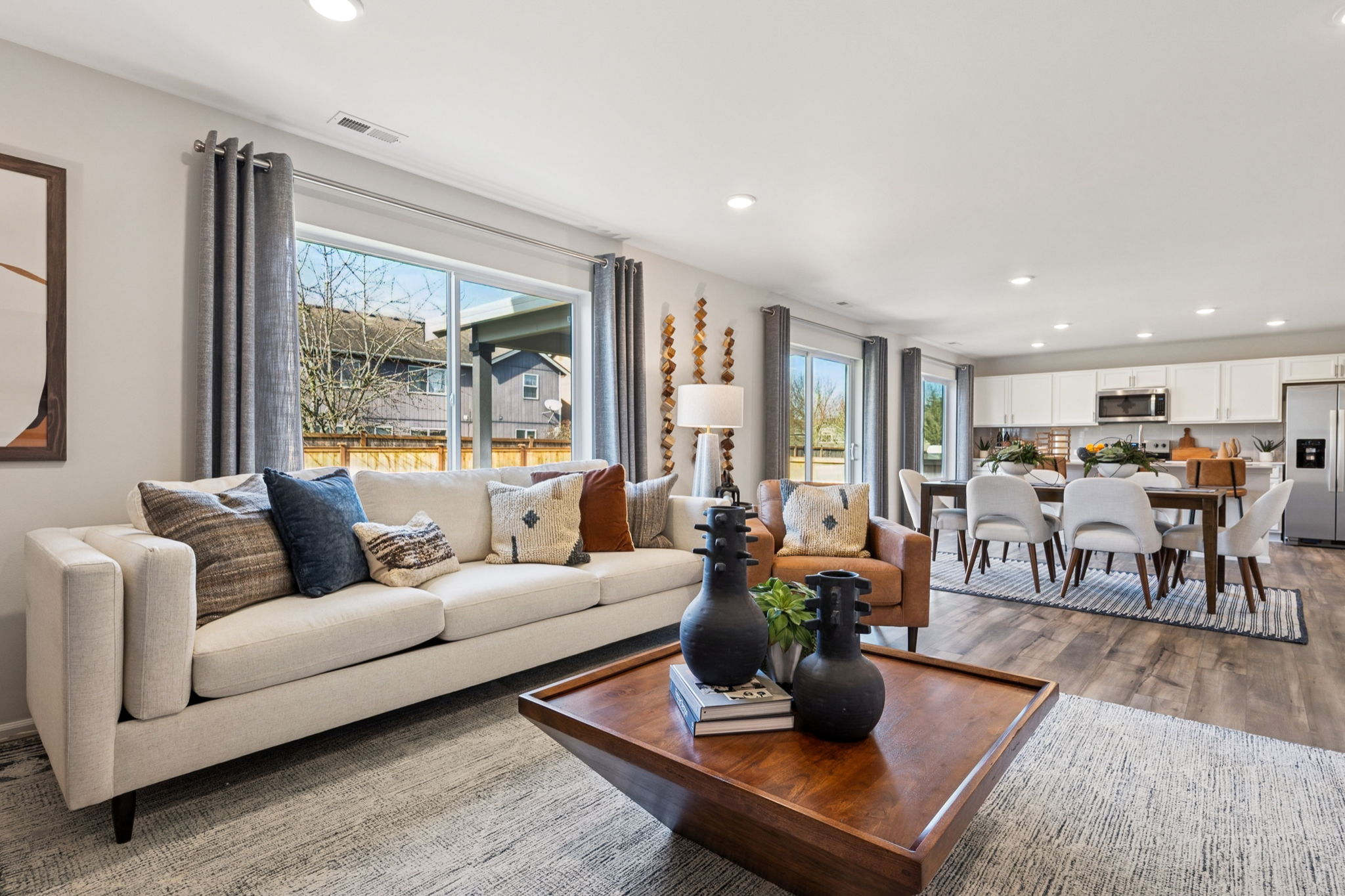 A living room with a large window.