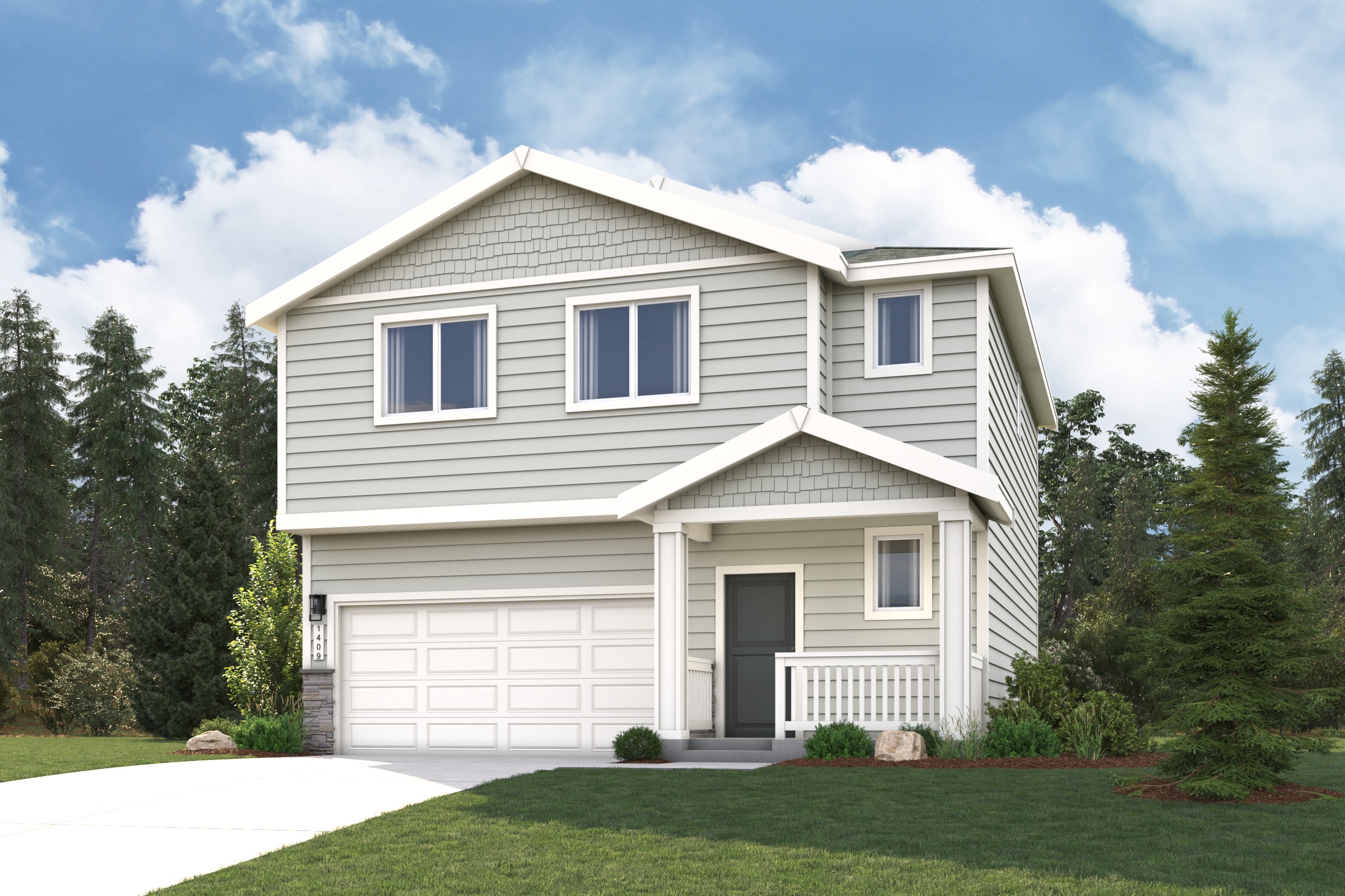 A house with a garage and trees around it.