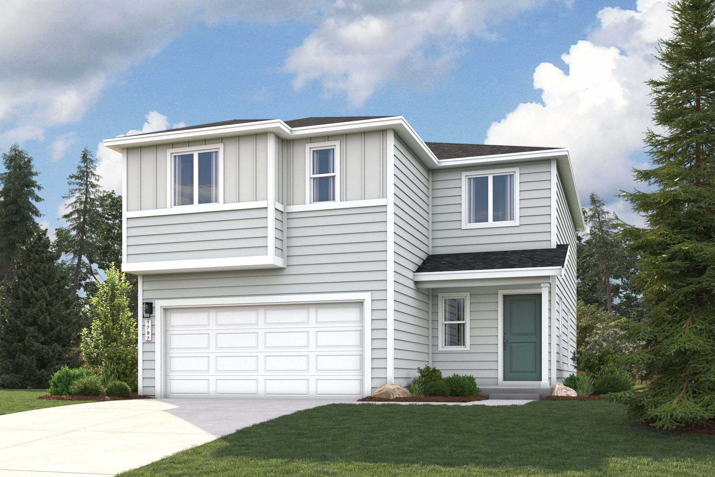 A white house with a garage.