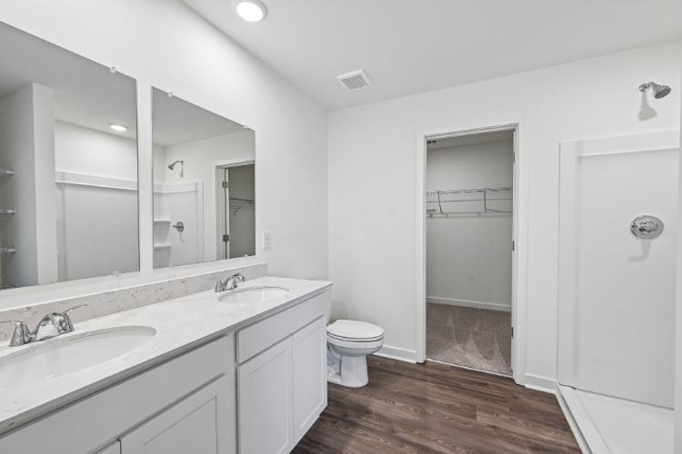 A bathroom with a standup shower.