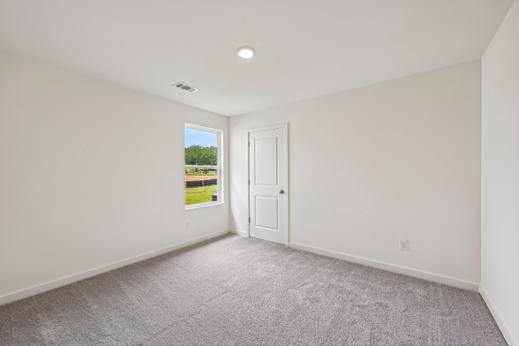 A room with a door and a window.