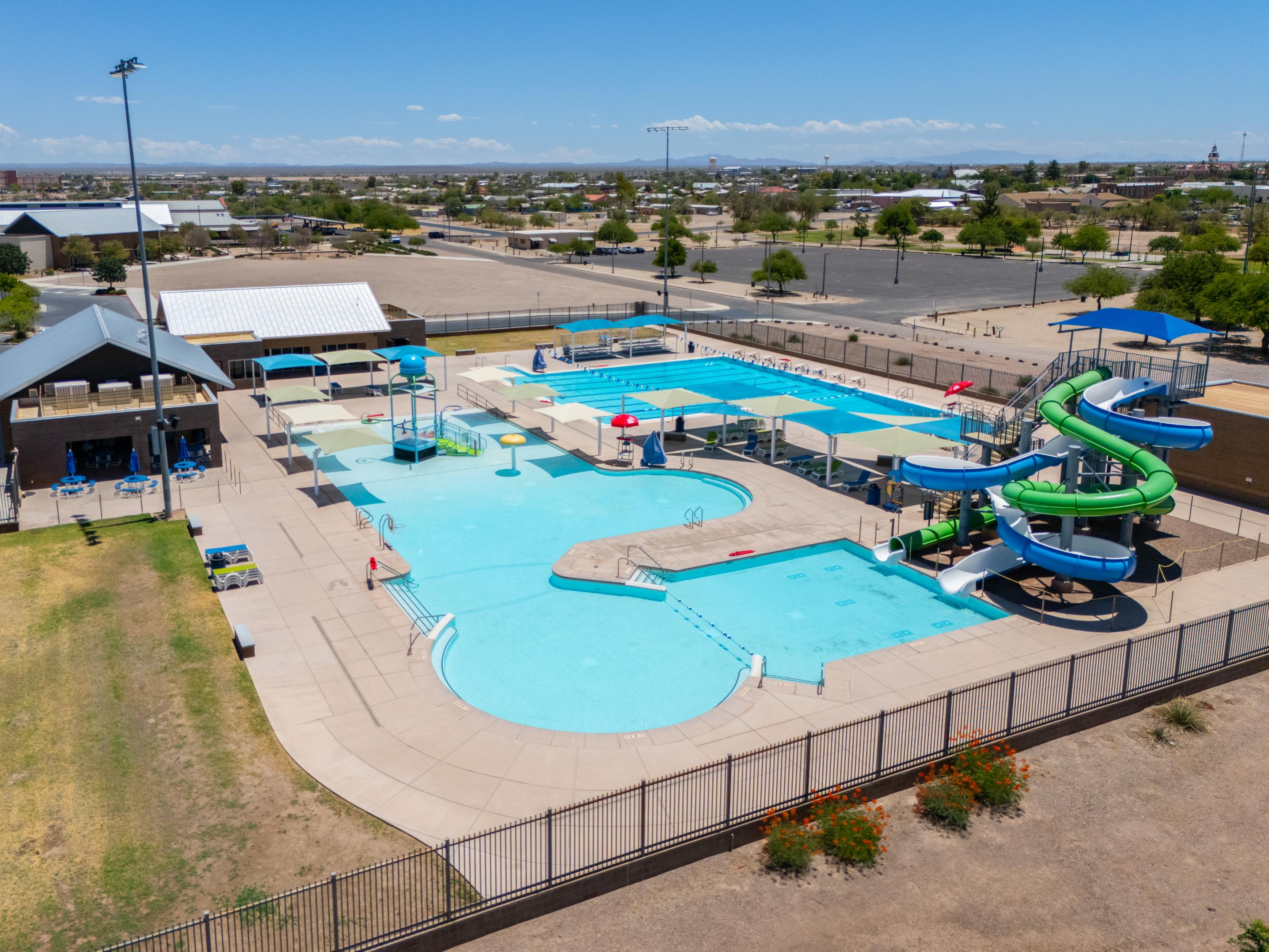 A swimming pool with a slide.