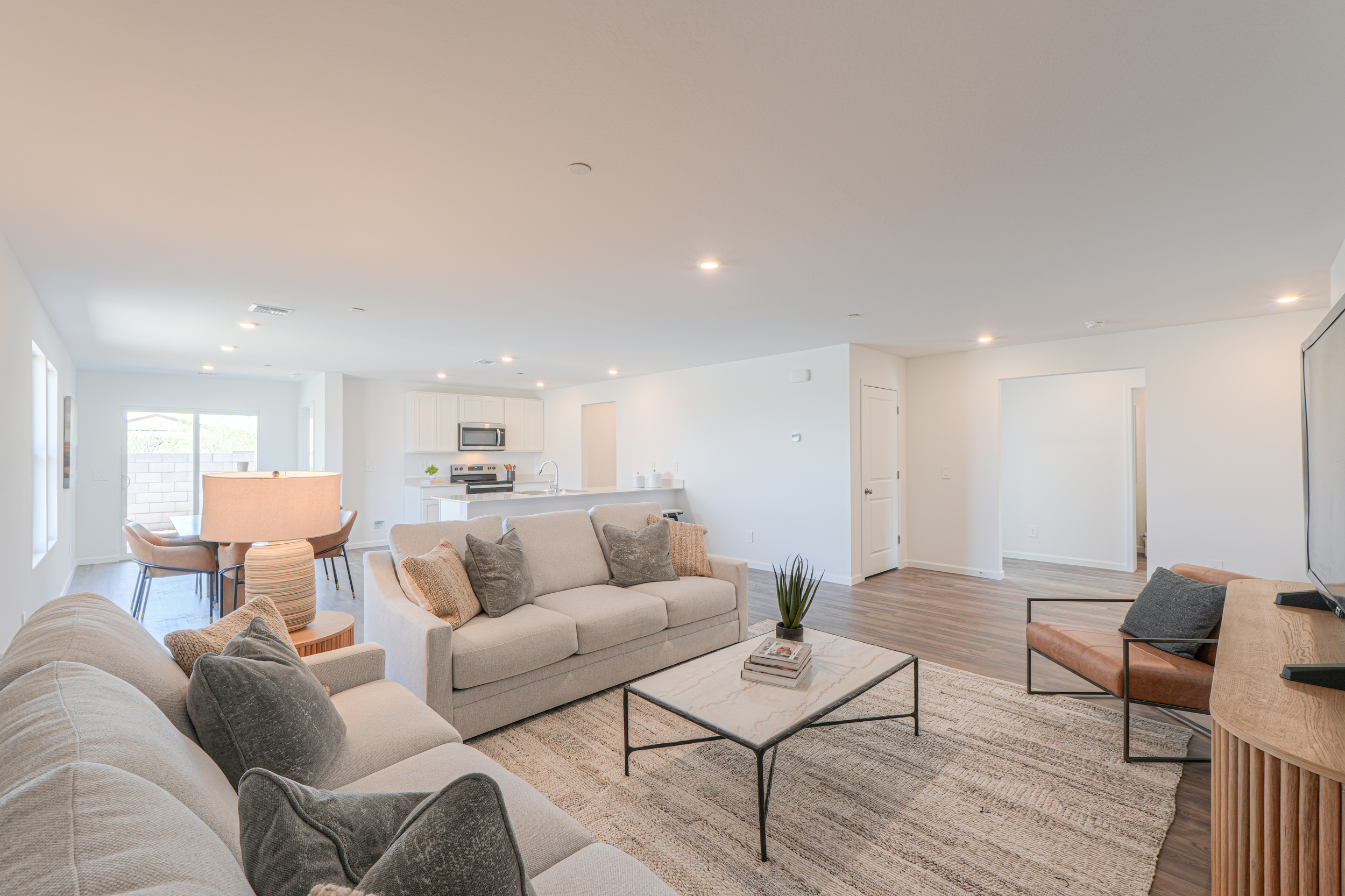 A living room with a couch and a coffee table.