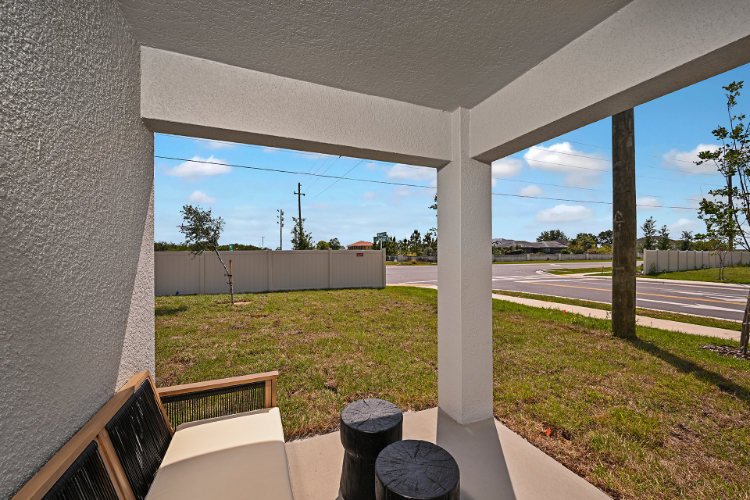 A view of a road through a window of a building.