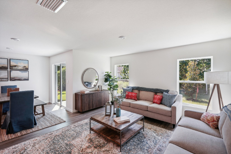A living room with a couch and a coffee table.