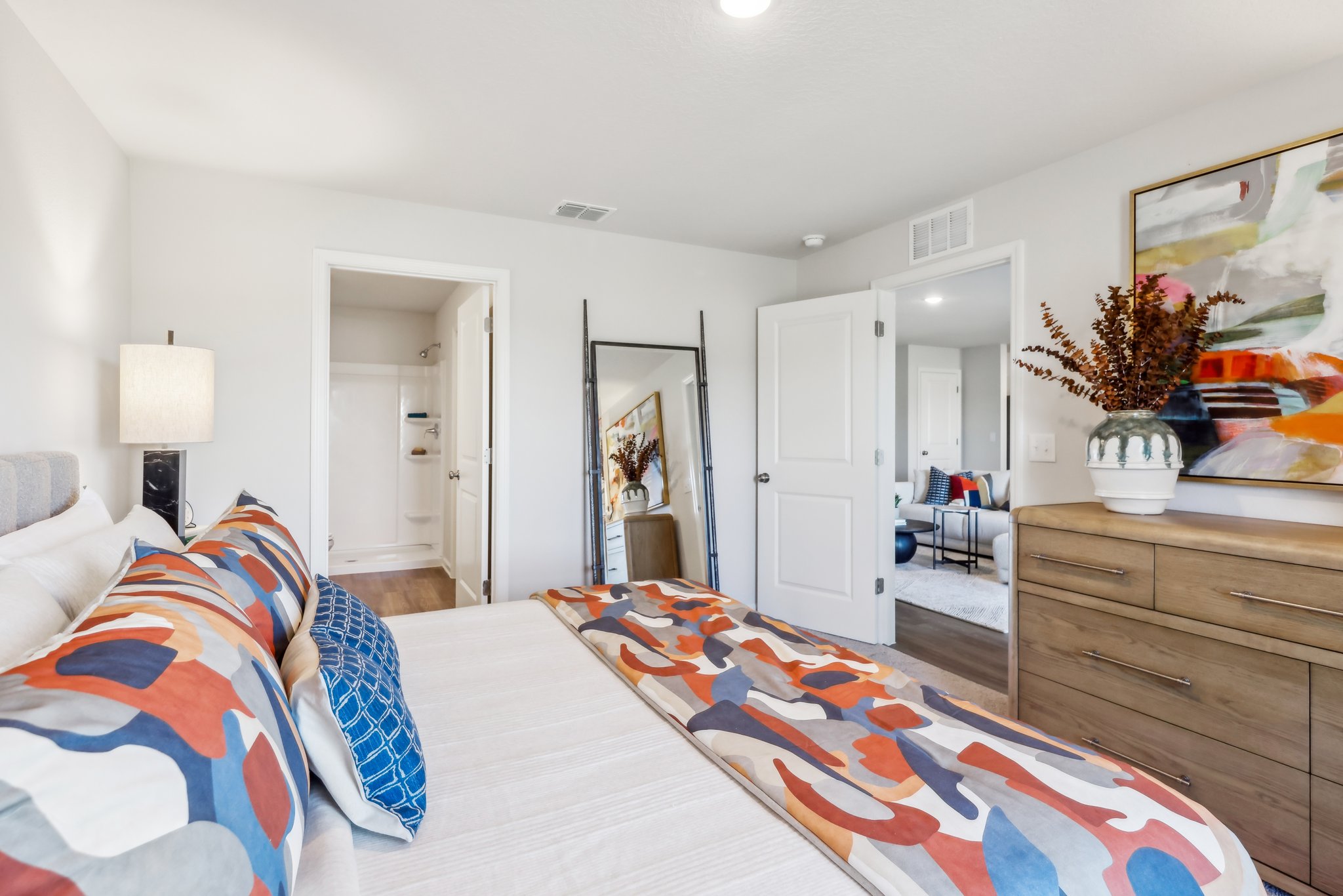 Owner's suite with attached bathroom and walk-in closet.