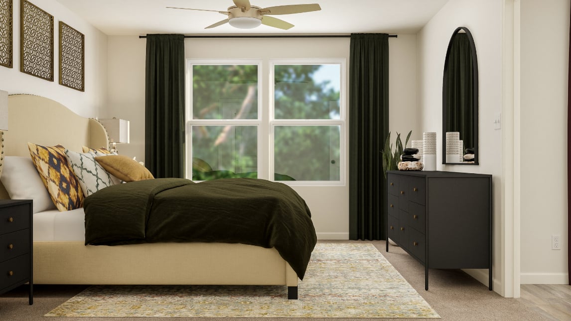 A bedroom with a bed and a window.