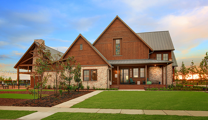 A house with a lawn and trees.