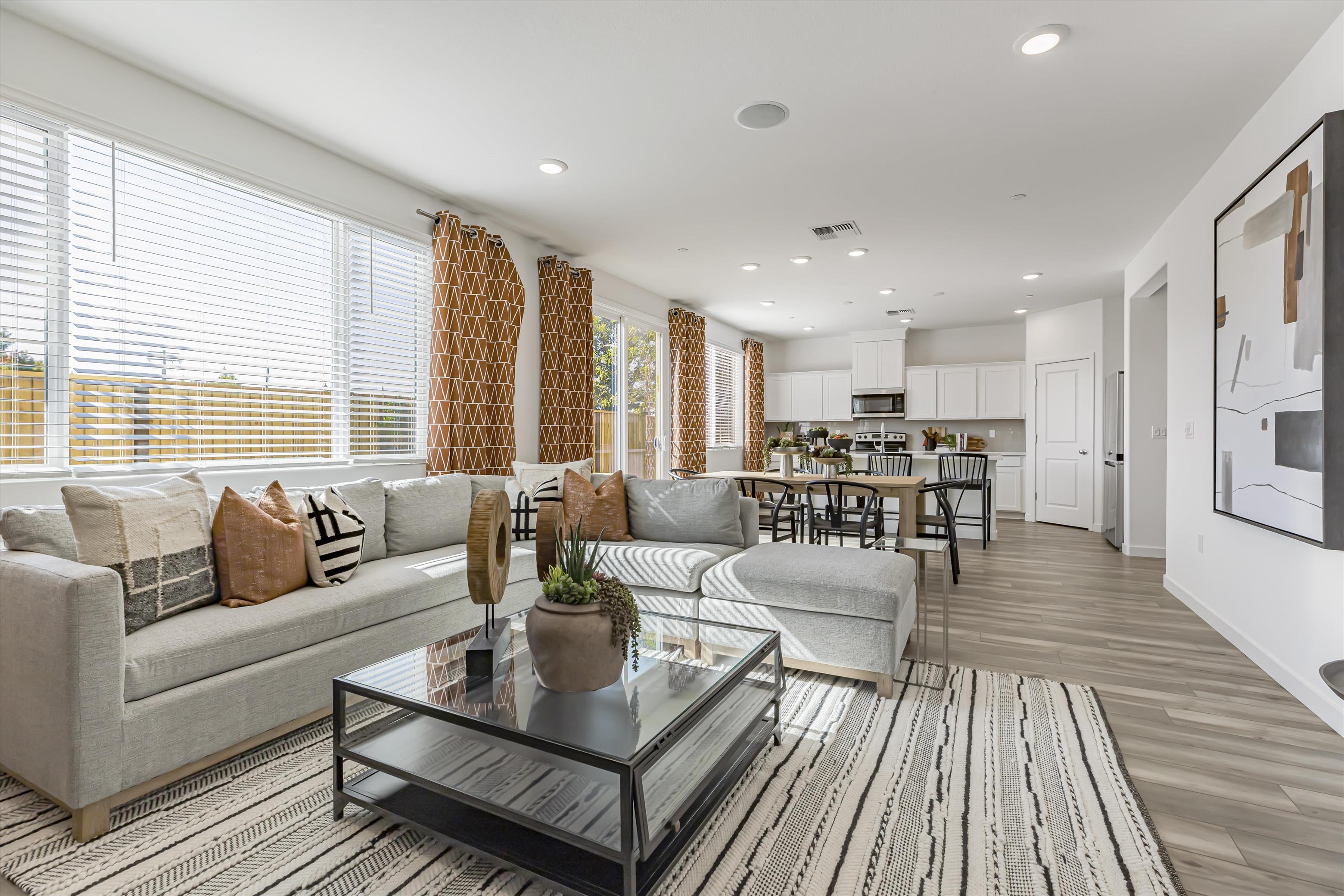 A living room with a large window.